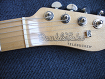 Logo on hand made headstock.