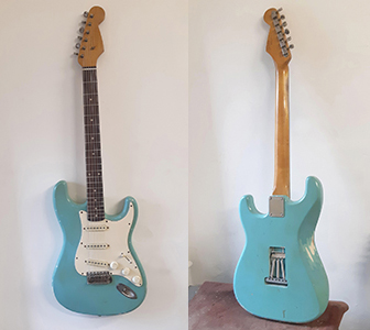 In blue with white pickguard.